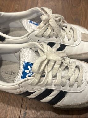 adidas White Sneakers with Black Three Stripes and Blue Tongue Logo